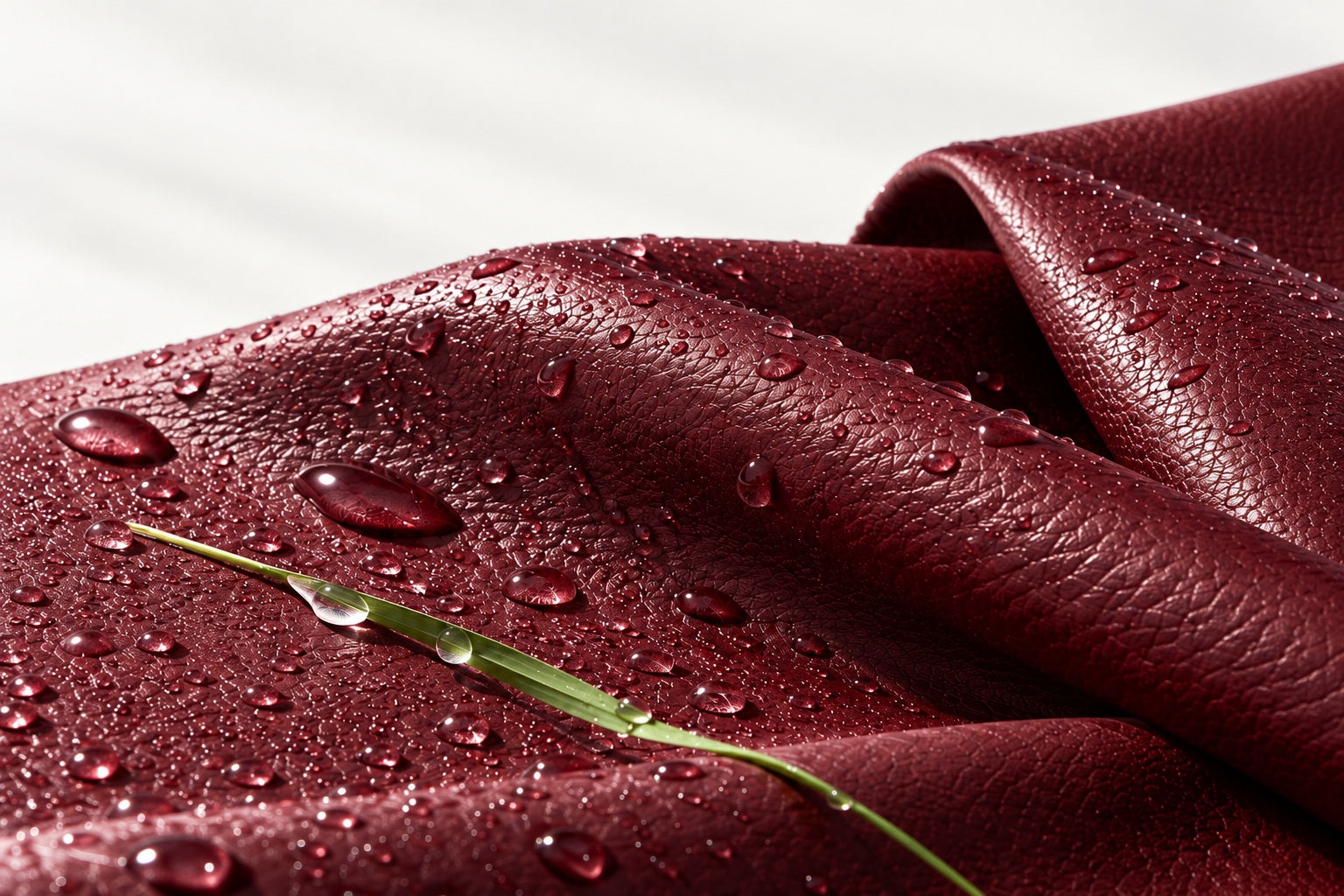 Design concept showing the fine grain of Bordeaux material with water droplets